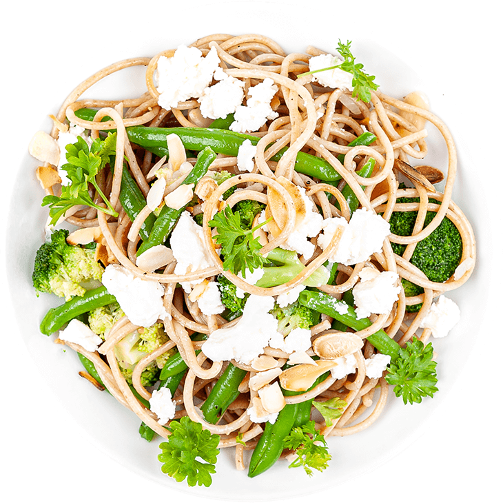 Spaghetti with feta cheese, green beans and broccoli