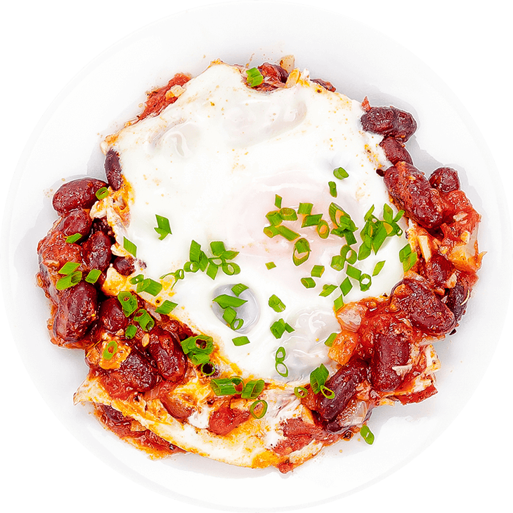 Eggs in tomato sauce with beans and onion (shakshuka)