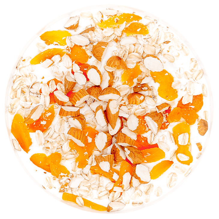 Soya yoghurt with oat flakes, dried apricots and almonds