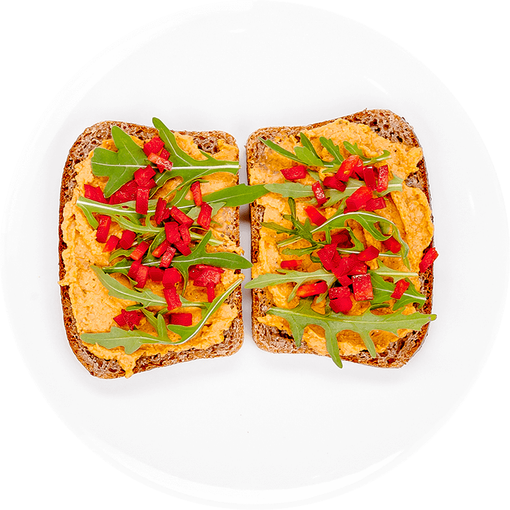 Sandwich with chickpea and dried tomatoes paste with pepper