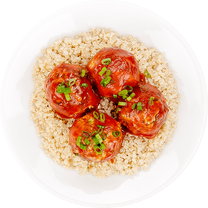 Cod fishballs in tomato sauce on quinoa