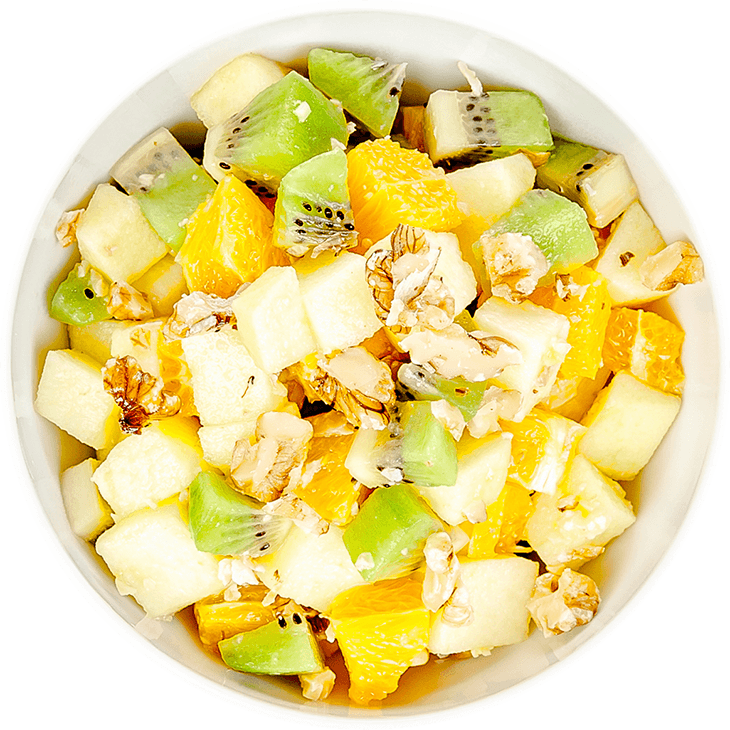 Fruit salad with apple, orange, kiwi and walnuts