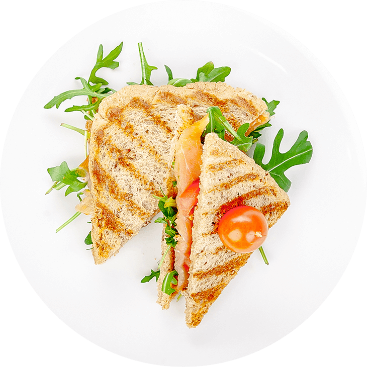 Sandwich with salmon, tomato and rocket
