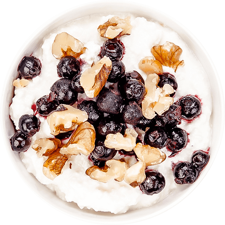 Cottage white cheese with billberries and walnuts